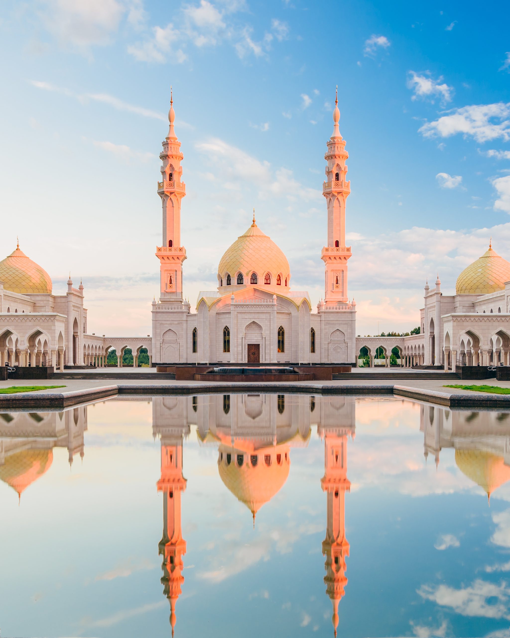 Public White Mosque with Domes and Minarets in the historic hill-fort Bulgar, Russia. Operates exclusively as places of worship.